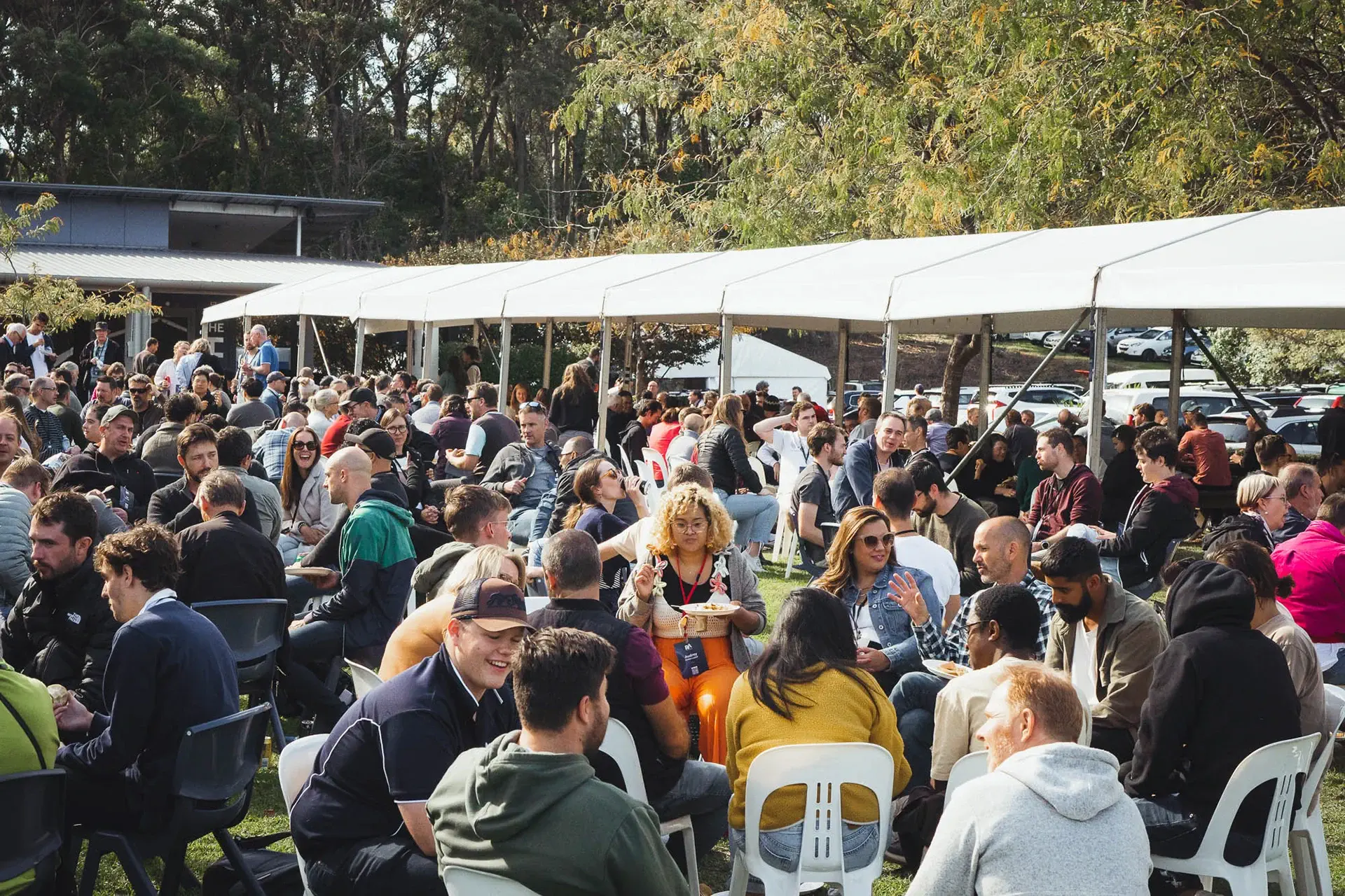 A large group eating lunch at the Reach Australia National Conference 2023